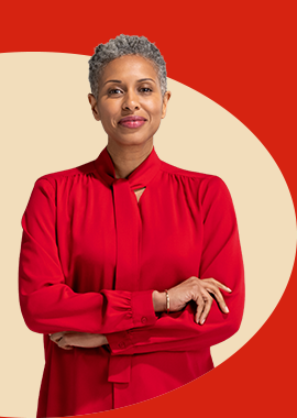 State Farm agent in red blouse and scarf smiles.